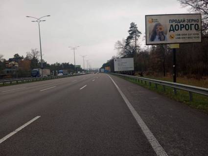 Білборд, Бігборд (Борд)  A у Києві, 6х3  Бориспільська траса, навпроти  ресторанау "Козацький стан" (межа міста, стелла Києва,  будівельний супермаркет Нова Лінія). 1,5 км до Харківської площі. Електроопора № 16 (в районі 19 км 200 м), у напрямку до Києва Фото 1