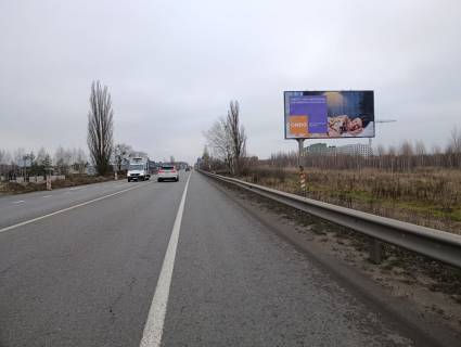 Билборд A в Гостомеле, 6х3  траса М-07 "Київ-Ковель", км 22+500 право, вул. Кулішова, 33, перед поворотом на с. Горенка, за 225м до автобусної зупинки "Горенка", верх фото 1