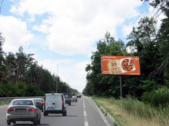 Билборд Вышгород,  Богатирська вул.  в напрямку Вишгорода.  Вишгород, траса на Межигір’я, зоопарк "12 місяців",  за 150 м до повороту на ЖМ "Дідовиця"