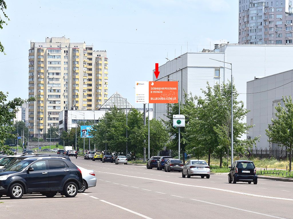 Борд Киев,  Микільсько-Слобідська вул., 4В, біля МВЦ, в сторону супермаркету Novus, Шептицького вул., до ст. м. "Лівобережна"