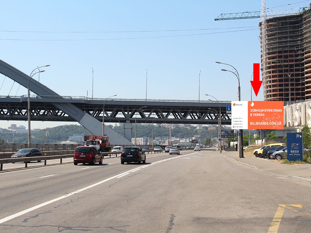 Призматрон, призма Київ,  Набережно-Рибальська вул., Перед Подільсько-Воскресенським мостом, в бік Подолу