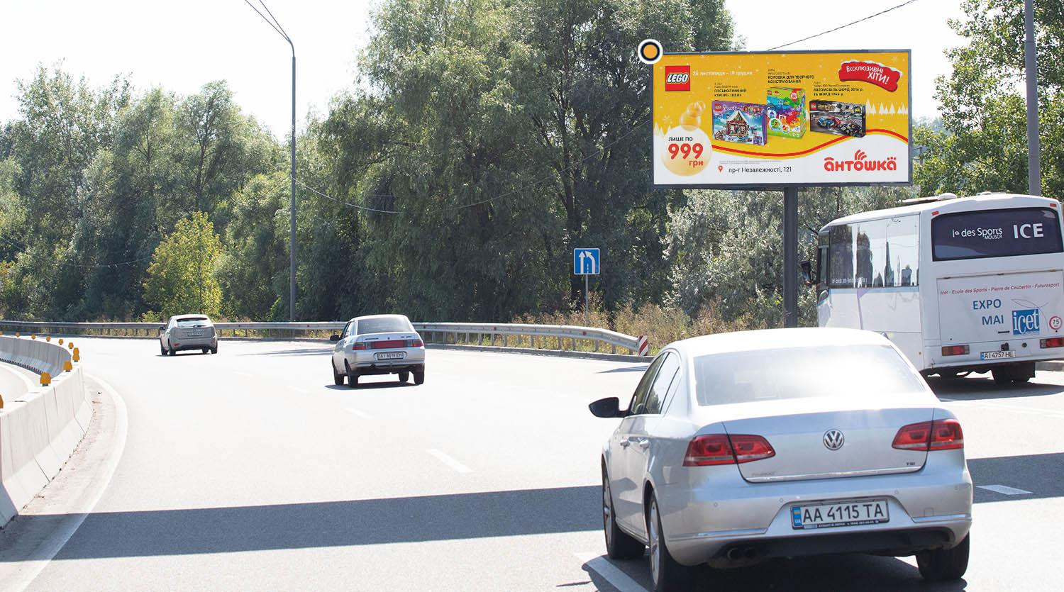 Білборд, бігборд (борд)  Київ,  Дніпровське шосе, в напрямку до Обухова, за КПП, за пішохідним мостом (справа)