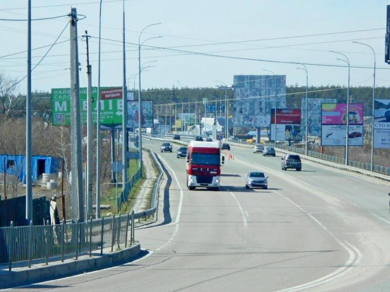 Білборд, бігборд (борд)  Ірпінь,  м. Ірпінь, траса М-07, км 23 + 000 право, міст через р. Ірпінка, 750м до Розвилка Ірпінь-Гостомель-Буча, ЖК "Гостомель Резіденс"