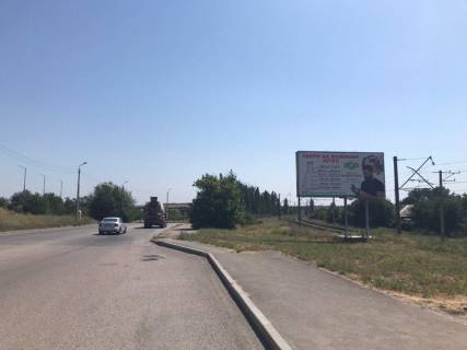 Билборд A в Запорожье о.Хортиця, вїзд на мост Преображенського в сторону Хорт.р-ну, вздовж зал.колії 169км+770м фото 1