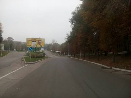 Билборд A в Каменское (Днепродзержинск), 6х3  авторозв'язка пр. Гімназичний - вул. Йосипа Манаєнкова - вул. Васильєвська (на роздільній смузі), напрямок до нового мосту фото 1