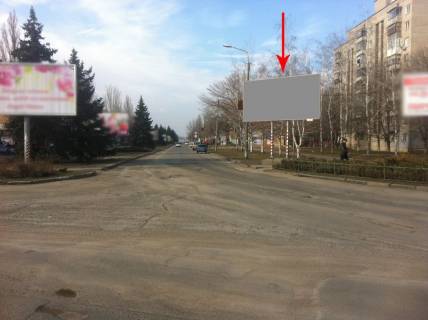 Билборд A в Никополе Нп3А,вул.Першотравнева, 1, напрямок руху до ТЦ ЦУМ,  Автовокзалу, центральна кільцева розв'язка міста фото 1