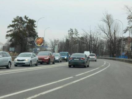Билборд B в Ворзеле м. Буча, траса М-07 "Київ-Ковель", км 30+600 право, через 150м після поворту на автошлях Т1001 та смт. Ворзель, за 450м до автобусної зупинки, за 500м до перехрестя з вул. Депутатська та ЖК "Буча-Квартал", за 550м до АЗС WOG та ТЦ "Retail Park Bucha" фото 1