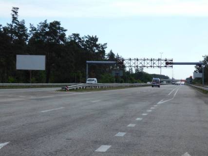 Білборд, Бігборд (Борд)  B у Березівці с. Березівка, траса М-06 "Київ-Чоп" (Житомир), км 36+500 право, навпроти TIR автомобільної стоянки, за 500м до АЗС БРСМ-Нафта, через 550м після ресторану "Бістро Пекаря", через 650м після отелю "Мезон Бланш" Фото 1