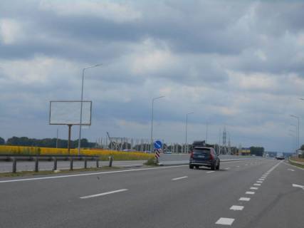 Билборд B в Бровары Траса М-01 "Київ-Чернігів-Нові Яриловичі", км 24+600 право, об'їзд м. Бровари, за 1.4км до перетину вул. Переяславський Шлях та вул. Лагунової, ресторану "Петрівський Бровар" та АЗС ОККО, через 900м після повороту на трасу Р-03 (Північно-Східний фото 1