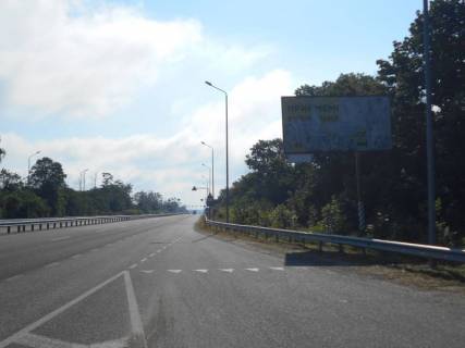 Білборд, Бігборд (Борд)  A у Київських трасах Траса М-06 "Київ-Чоп" (Житомир), км 43+500 ліво, за 300м до повороту на Мотижин та автобусної зупинки Фото 1