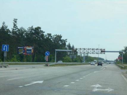 Білборд, Бігборд (Борд)  B у ,  с. Березівка, траса М-06 "Київ-Чоп" (Житомир), км 36+500 право, навпроти TIR автомобільної стоянки, за 500м до АЗС БРСМ-Нафта, через 550м після ресторану "Бістро Пекаря", через 650м після отелю "Мезон Бланш" Фото 1