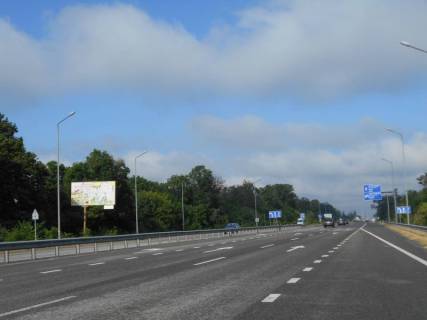 Билборд B в Київських трасах Траса М-06 "Київ-Чоп" (Житомир), км 43+500 ліво, через 300м після повороту на Мотижин та автобусної зупинки фото 1