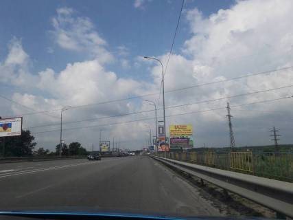 Білборд, Бігборд (Борд)  A у Гостомелі, 6*3  Траса Київ-Ковель (праворуч), напрямок з Києва, на мосту Фото 1