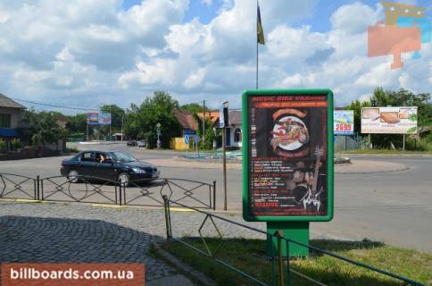 Сiтiлайт A у Тячеві вул. Незалежності, центр міста, біля страхової компанії Acsa та магазину Міленіум, автобусні зупинки, великий потік пішоходів Фото 1