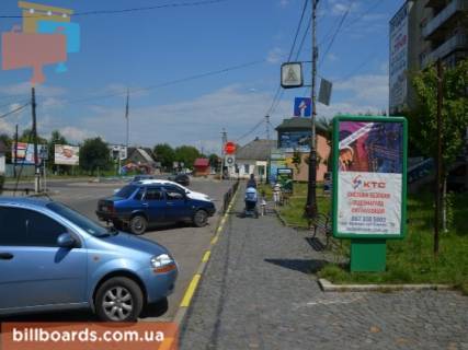 Сiтiлайт A у Тячеві вул. Незалежності, центр міста, біля страхової компанії Acsa та магазину Міленіум, автобусні зупинки, великий потік пішоходів Фото 1