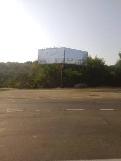 Білборд, Бігборд (Борд)  B у Лубнах, 3х6  вул. Вишневецьких, 24 (виїзд з міста на трасу Київ-Харьків, до заміського комплексу "Лубенська Слобода") Фото 1