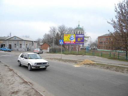 Билборд A в Изюме, 3х6  центр, поворот                ул.Фрунзе фото 1