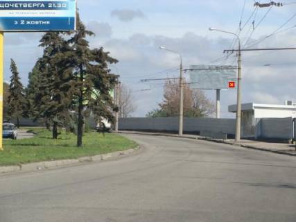 Билборд A в Запорожье вул.Перемоги,129а - напроти БК "Титан"; рядом с АЗС ВОГ, ст.А фото 1