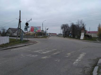 Білборд, Бігборд (Борд)  B у Романові, 6x3  Романів вул.Фрунзе 10, центр міста, ст.Б Фото 1