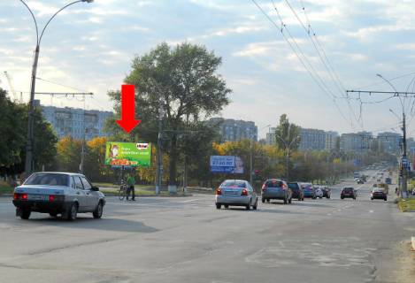Билборд  в Сумах, 3x6  Харківська вул. / Табали вул. (кол. Паризької Комуни вул.), біля супермаркету "АТБ", АЗС "ОККО", автосалону "Kia" фото 1