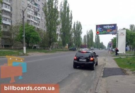 Білборд, Бігборд (Борд)   у Одесі Гайдара ул., 13А, возле супермаркета "Ева", в сторону Филатова ул. Фото 1