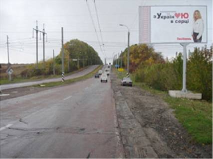 Білборд, Бігборд (Борд)  A у Рівному Млинівська вул., 32, навпроти, виїзд з міста, в сторону м Луцьк Фото 1