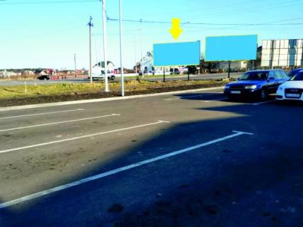 Білборд, Бігборд (Борд)  A у Жовкві, 3x6  вул., 28, територія автопарковки АТБ, пряма видимість при виході з дверей супермаркету Фото 1