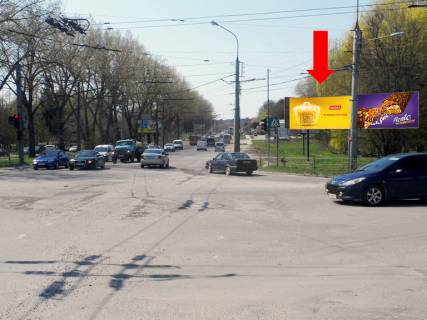 Билборд A в Тернополе, 3x6  Злуки пр. / 15-го Квітня вул., біля ТЦ "Мандарин", супермаркету "Сільпо", в центр, ліва фото 1