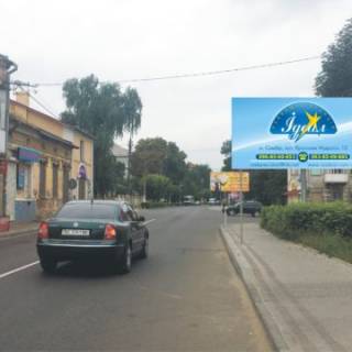 Билборд  в Сколе вул. Шевченка, роздоріжжя траси Львів-Ужгород-Мостиська, 100м до центру, сторона А, на Ужгород фото 1