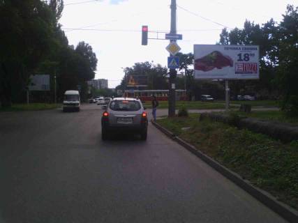 Билборд A в Днепр (Днепропетровск), 6х3  вул. В’ячеслава Чорновола (Юрія Савченка), 26 фото 1