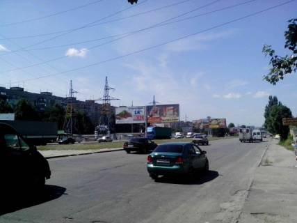 Билборд A в Днепр (Днепропетровск), 6х3  Донецьке шосе – вул.Березинська (за поворотом на ТРЦ Караван), до центру, праворуч фото 1