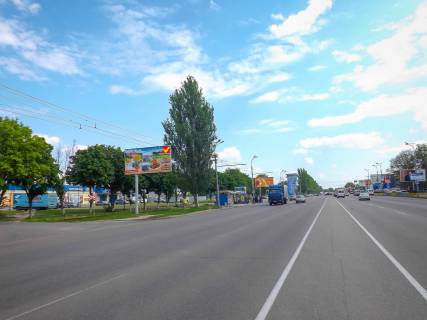 Билборд B в Днепр (Днепропетровск), 6х3  Запорізьке шосе – вул.Панікахи, а/салон "Porsche" фото 1