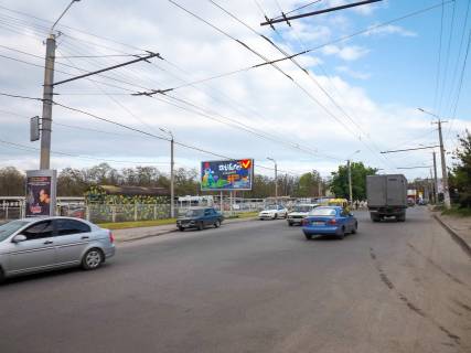 Білборд, Бігборд (Борд)  B у Дніпро (Дніпропетровськ), 6х3  вул.Марії Лисиченко, автостоянка Фото 1