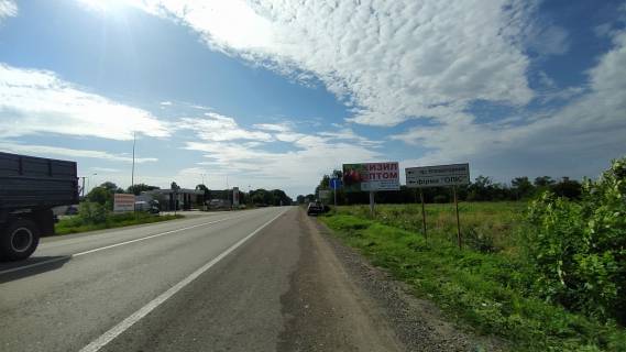 Билборд A в Васильевке, 6х3  бул. Центральный 14, тр-М18   АЗСПАРАЛЕЛЬ фото 1