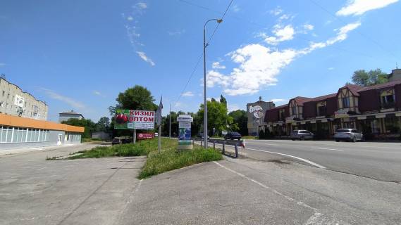 Билборд B в Васильевке, 6х3  центр города бул. Центральный 14, тр-М18 фото 1