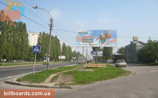 Билборд A в Ровно, 3х6  м. Рівне вул. Шухевича 12, навпроти автозаправки “OKKO” та перехресті вулиць Шехевича/Андрія Мельника, неподалік офісний центр фото 1