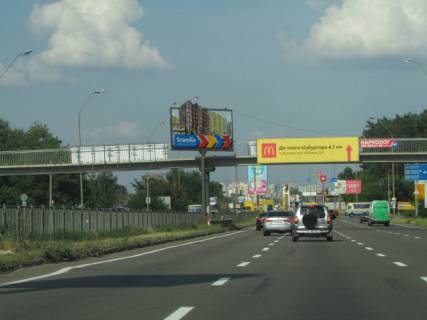 Білборд, Бігборд (Борд)  A у Києві, 6x3  Броварський проспект розподілювач (зупинка Військове містечко), рух в напрямку Броварів схема