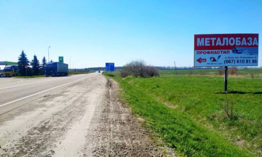 Білборд, Бігборд (Борд)  A у Буськ, 6x3м.  м. Буськ, поряд АЗК ОККО, виїзд з міста в сторону м. Львів + весь транспорт з м. Броди, м. Київ на м.Львів, траса Львів - Київ (Е-40), + жовта вітрозахисна люмінесцентна рамка Фото 1