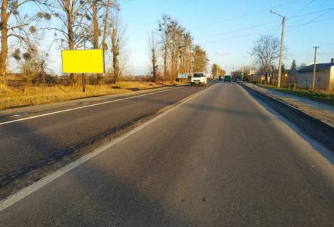 Білборд, Бігборд (Борд)  B у Сопошині, 6x3м.  с. Сопошин, виїзд з м. Жовква в напрямку м. Львів, траса Львів- Рава-Руська (М-09), поряд АЗК WOG, пішохідний перехід світлофор, зупинка гром. транспорту Фото 1