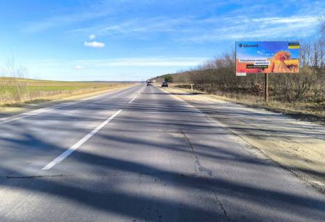 Білборд, Бігборд (Борд)  A у , , 6x3м.  Автодорога М06 (Київ  - Чоп), м. Миколаїв, обїздна, на АЗК OKKO, видимість на м. Львів Фото 1