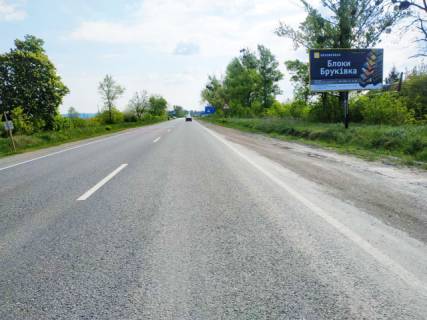 Билборд A в Золочеве (Львовской обл), 6x3м.  центральний вїзд з сторони м. Львів + обїздна дорога на м.Тернопіль, траса Львів - Тернопіль (Н-02) + АЗК CNG и ANP + жовта вітрозахисна люмінесцентна рамка фото 1