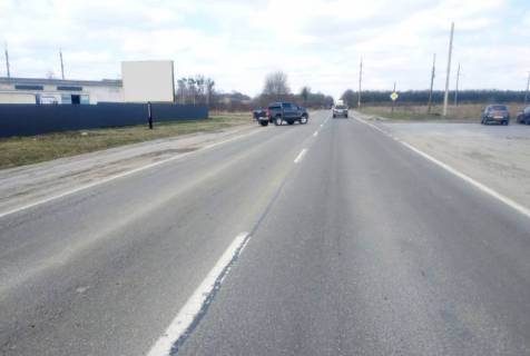 Білборд, Бігборд (Борд)  B у Радехові, 4x3м.  м. Радехів, вул. Транзитна, виїзд з міста в напрямку м. Горохів, траса Львів - Луцьк (Н-17), на м. Горохів + жовта вітрозахисна люмінесцентна рамка Фото 1