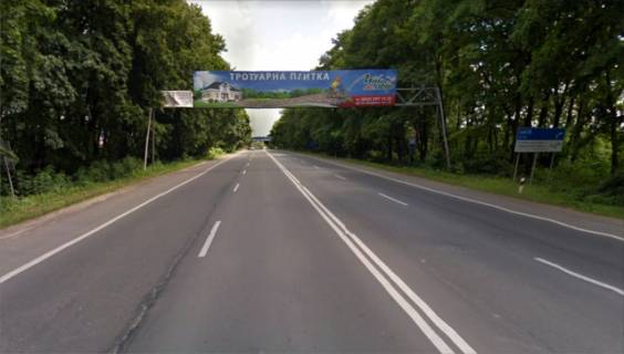 Брандмауэр A в Львове Арка въезд в г.Львов с направления г.Городок (трасса M-11 Львов - Шегины) возможен монтаж постеров 18*3м. / 6*3м. (3 плоскости) + КП Полиция фото 1