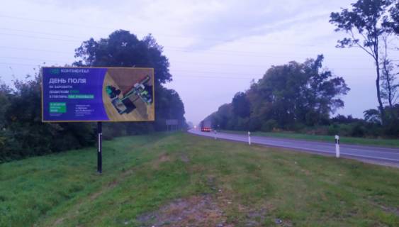 Билборд B в Олесько, 6x3м.  м. Буськ, виїзд з міста в сторону м. Львів + весь транспорт з м. Броди, м. Київ на м.Львів, траса Львів - Київ (Е-40), + жовта вітрозахисна люмінесцентна рамка фото 1
