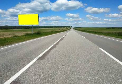 Білборд, Бігборд (Борд)  B у трасах Львіва, 6x3м.  Кордон, на кордон з респ. Польща, автодорога Львів - Рава - Руська (М-09) + АЗК + жовта вітрозахисна рамка, черга вантажівок не закриває видимість щита !!! Фото 1