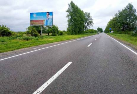 Билборд B в Жовкве, 6x3м.  м. Жовква, вїзд в місто з сторони кордону (м. Рава - Руська), на обїздну, на м.Львів, м.Червоноград, на АЗК БРСМ, траса Львів- Рава-Руська (М-09) фото 1