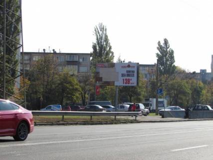 Билборд B в Киеве, 6x3  Братиславська, 12 напроти  / Олександра Бойченка, рух до Броварського проспекту, ліворуч фото 1