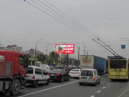 Видеоборд A у Києві, 6x3  Шухевича пр-т (розподілювач), ТЦ "Райдужний", рух від Північного мосту - 297804 Фото 1