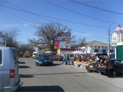 Білборд, Бігборд (Борд)  A у Білій Церкві, 6х3  вул. Ярмаркова, біля аптеки, навпроти центрального ринку Фото 1