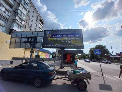 Билборд B в Бердичеве, 3х6  вул. Житомирська, 20,  ринок, АТБ, в центр фото 1
